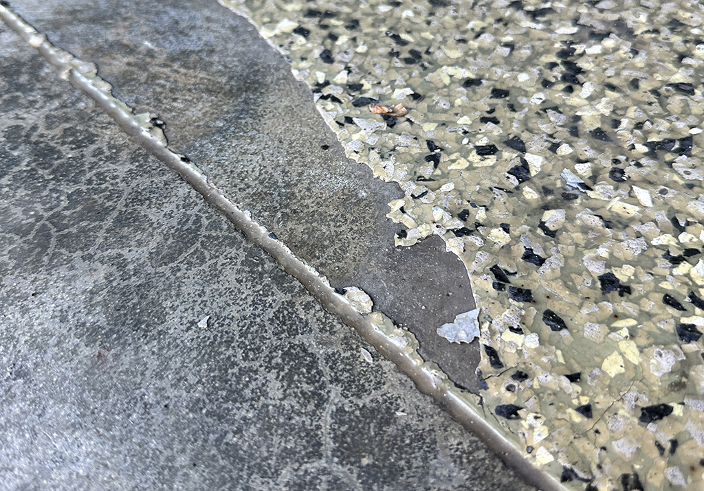 old epoxy already starting to crack and chip away